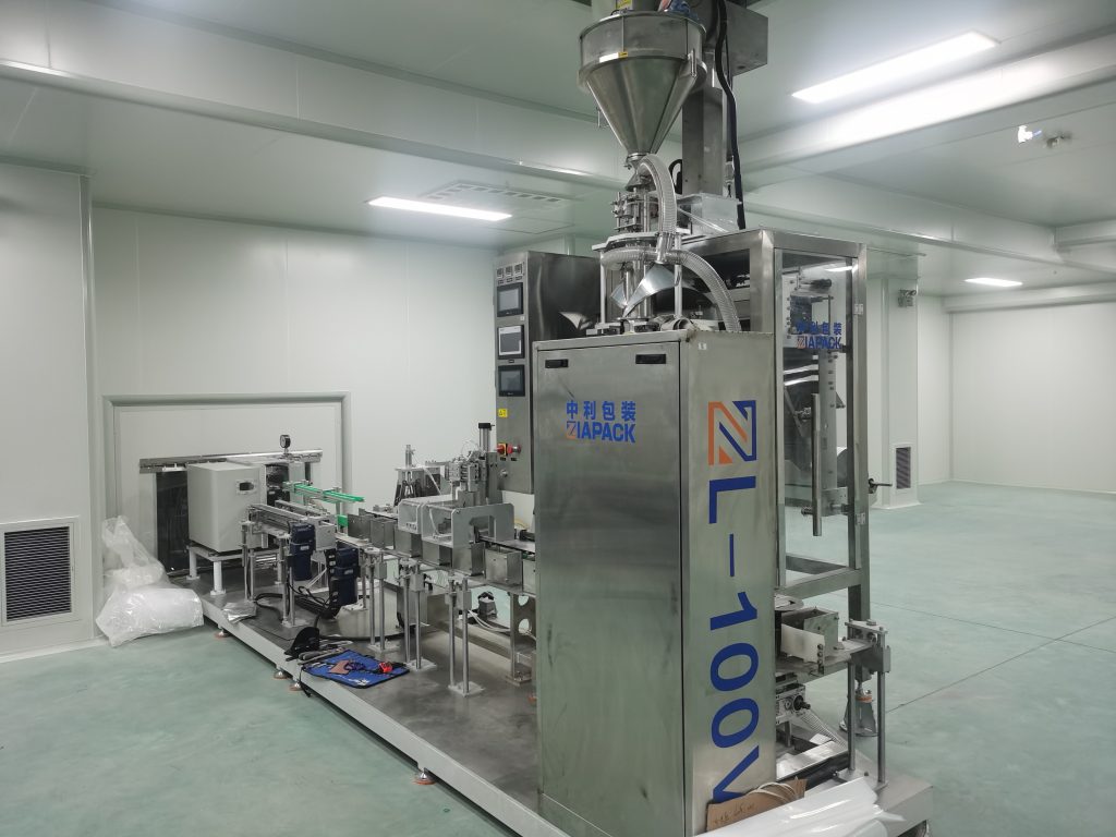 पाउडर वैक्यूम पैकिंग मशीन